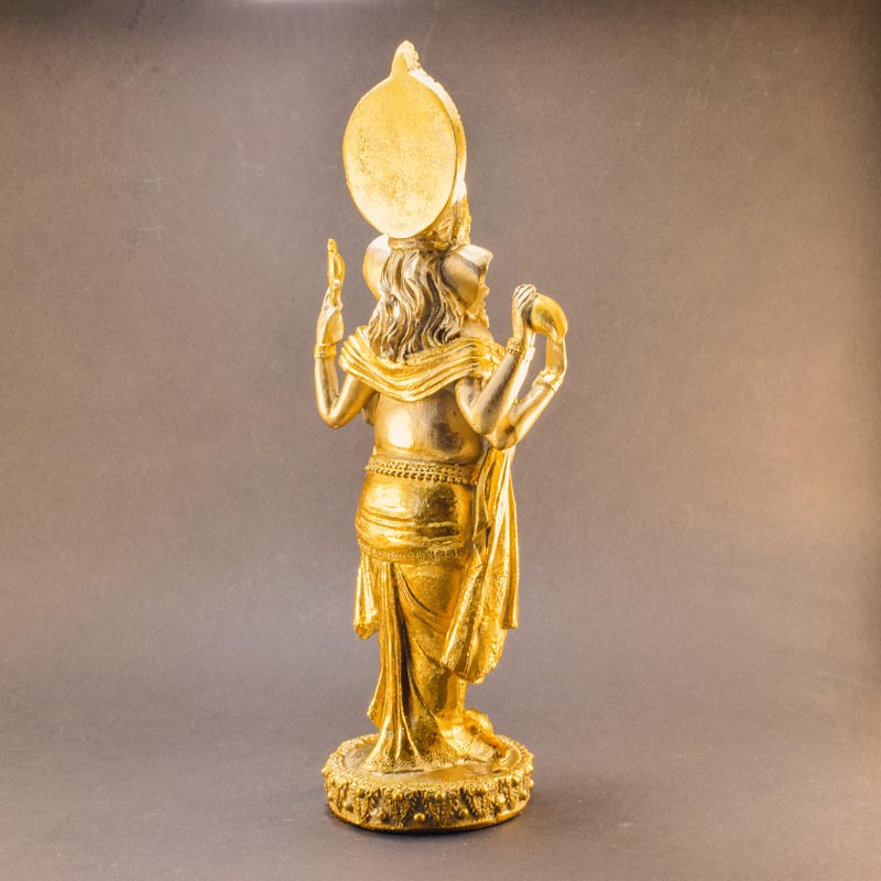 Arany Ganesha szobor, egy ülő elefántfejű istenség szobra arany színűre festve.